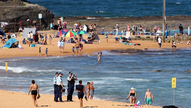 A man has died after being pulled from the water at North Narrabeen Beach on Monday afternoon, close to the entrance to Narrabeen Lagoon. Picture: Toby Zerna