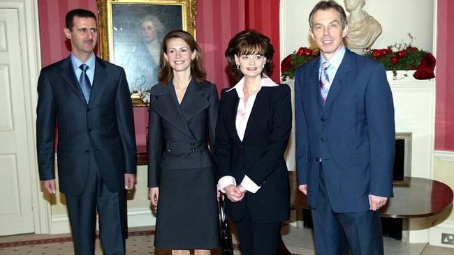 In December 2002, then-British PM Tony Blair, right, and wife Cherie, second right, met with Syrian President Bashar al-Assad and his wife Asma at London's No 10 Downing Street.