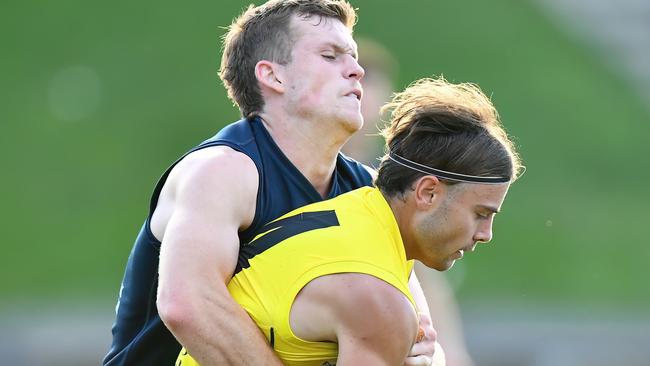 Josh Sticca of Balwyn is tackled by Braedyn Bowden of Berwick. (Photo by Josh Chadwick)