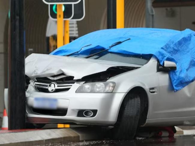 A man has died after being hit be a vehicle that was allegedly seen driving erratically moments before the incident.A blue tarpaulin covers the car involved in the incident in Bayswater. Picture: ABC