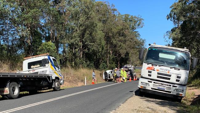 The scene of a freak crash on Mary Valley Rd last week where an excavator fell on a Ute. Police at the time said it was caused by a pothole on the road. Photo: Maddie Manwaring