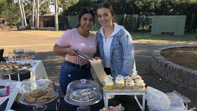 Holsworthy High School students Melis Salih and Brittney Robinson at the cake stall on election day. Pictures: Cindy Ngo