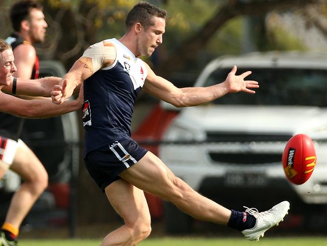 Ballarat FL footy: Melton South v Bacchus Marsh: Matthew Sullivan of Melton South kicks clear of Nicholas Stuhldreier of Bacchus MarshSaturday, May 1, 2021, in Melton, Victoria, Australia. Picture: Hamish Blair