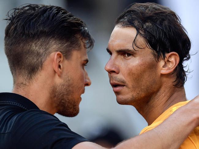 Rafael Nadal (R) congratulates Dominic Thiem (L) after their ATP Madrid Open quarter-final tennis match in Madrid on May 11, 2018. Picture: AFP Photo