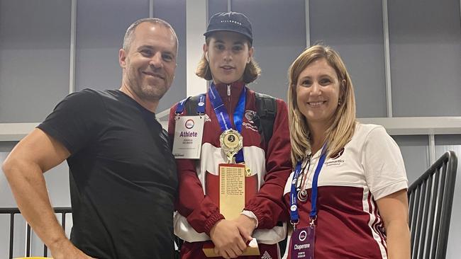 Reedy Creek's Peter and Robyn de Beer with their son Joshua, of Varsity College, currently Australia's youngest under 17 tumbling champion. He will go on to represent the nation at the world tumbling champs in Baku in Azerbaijan at the end of the year.