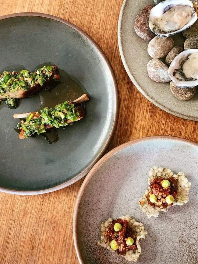 An assortment of Aloft's smaller dishes of first and second courses on the set menu including the Bruny Island oysters with onion flower mignonette, Bruny Island wallaby served with sichuan and nasturtium and the masterstock lamb ribs with black vinegar dressing. Picture: Supplied