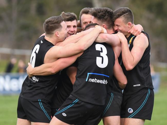 St Mary's players celebrate their NFL Division 3 premiership victory over Panton Hill. Picture: Nathan McNeill. 