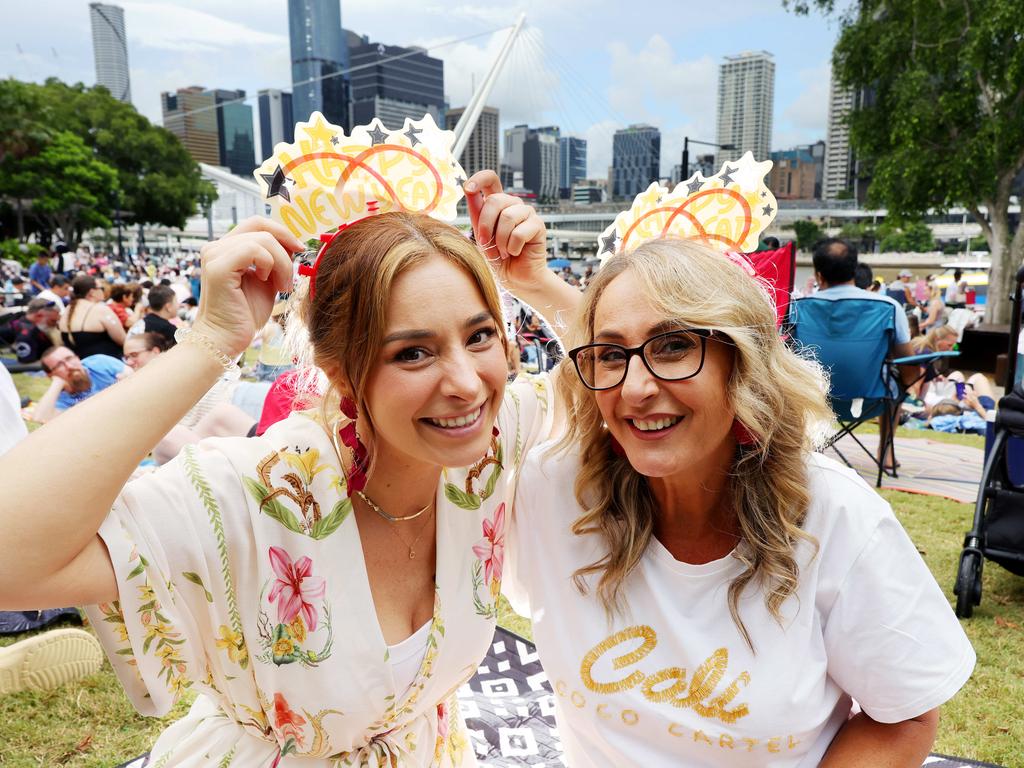 Jacqueline Gardner and mother Korina Krucican await the fireworks at South Bank. Picture: Steve Pohlner