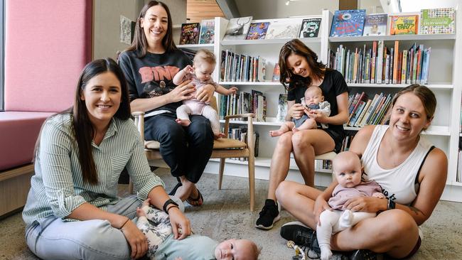 Emma Wade with baby Olivia, Jess Wilkinson with baby Miller, Sarah Luthaus with baby Heidi and Ashlee Greaves with baby Valerie during 'Babytime' at the New Mitcham Library. Picture: AAP Image/Morgan Sette