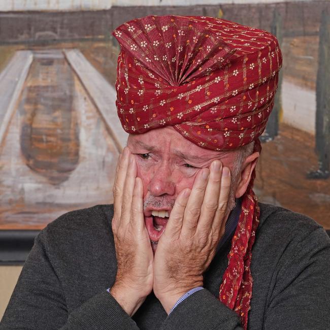 Manly Daily reporter Jim O'Rourke reacts after tasting the super spicy Platinum Jubilee Chicken Curry created by chef, and owner of the Ashiana Indian restaurant in Manly, Rajesh Kalra, to celebrate Queen Elizabeth II's 70 years on the throne. Picture: Max Agency