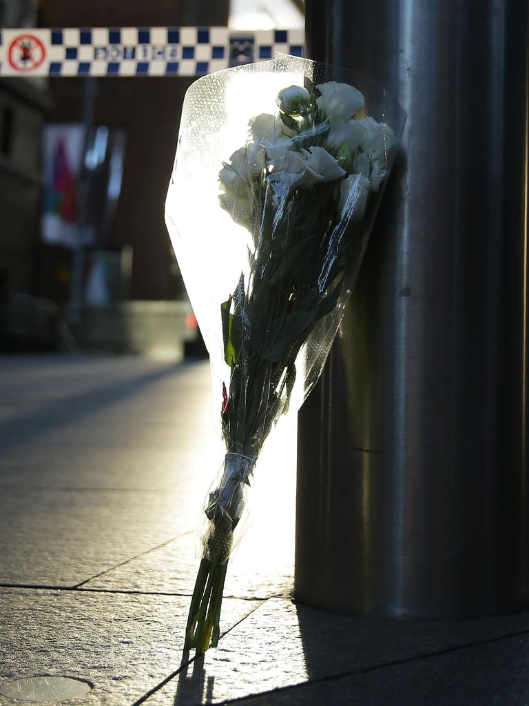 A floral tribute left after the siege in Sydney’s Lindt cafe. Picture: Mark Metcalfe (Getty Images).