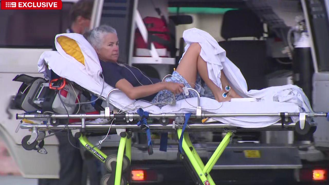 The final victim of the Fiji alcohol sickness is airlifted out of the country by medical staff. Picture: Nine News