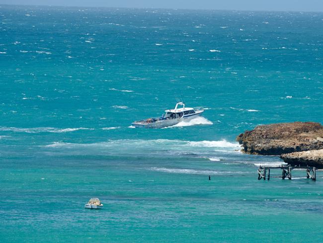 Boats continue the search for Glen Bollen. Picture: Frank Monger