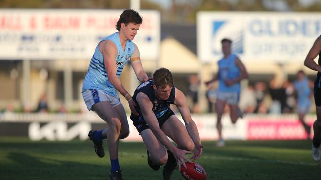 Glenunga’s Jack Matchett under pressure from SHOC’s Elijah Laube. 4 September 2021. Picture: Dean Martin