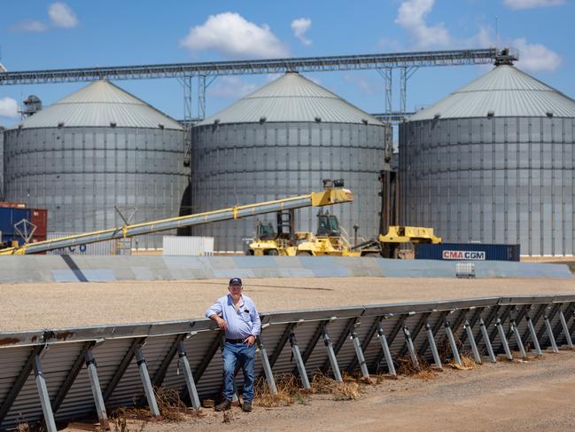 Roger Fletcher with bunkers and silos in background Pictures for The Weekly Times AgJournal magazine. Pictures: David Roma