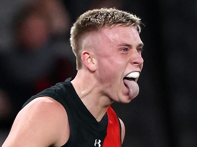 MELBOURNE, AUGUST 10, 2024: 2024 AFL Football - Round 22 - Essendon Bombers V Gold Coast Suns at Marvel Stadium. Picture: Mark MELBOURNE, AUGUST 10, 2024: 2024 AFL Football - Round 22 - Essendon Bombers V Gold Coast Suns at Marvel Stadium. Nate Caddy of the Bombers celebrates a goal.  Picture: Mark Stewart