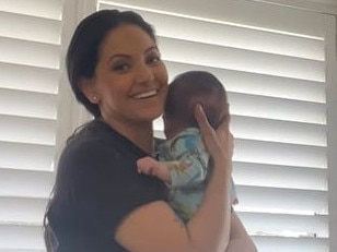 Sarah Marie Fahd holding her baby Lyon.