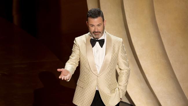 Host Jimmy Kimmel read aloud a Truth Social post written by Donald Trump that criticised him. Picture: Kevin Winter