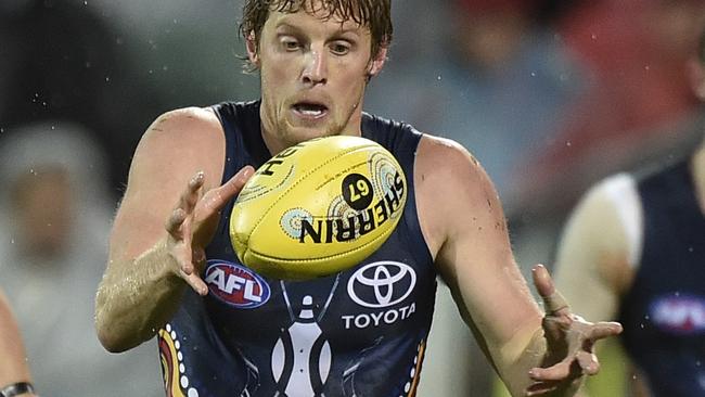 Rory Sloane gathers the ball against Fremantle. Picture: David Mariuz (AAP)