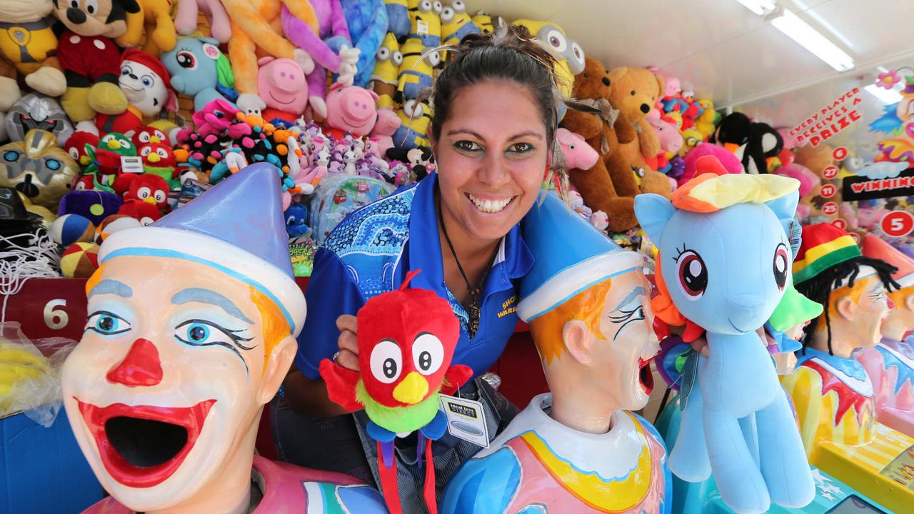 Gold Coast Show worker Kelly Big in with the laughing clowns. Picture: Mike Batterham