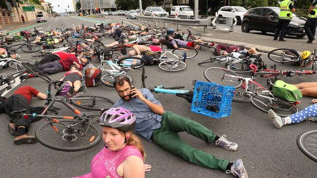 The die-in cyclist protest led by Councillor Johnathan Sri during peak hour traffic in South Brisbane. Picture: Liam Kidston.