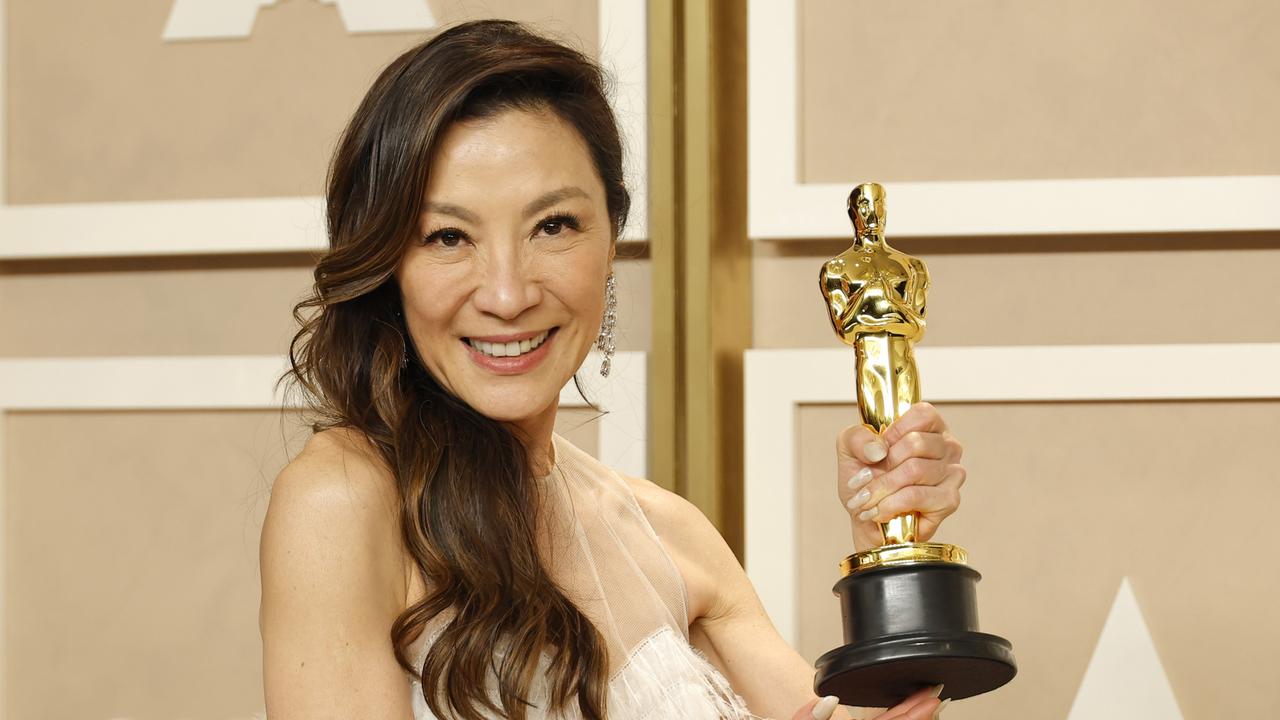 Michelle Yeoh as the first woman of Asian descent to win a Best Actress Oscar. (Photo by Mike Coppola/Getty Images)