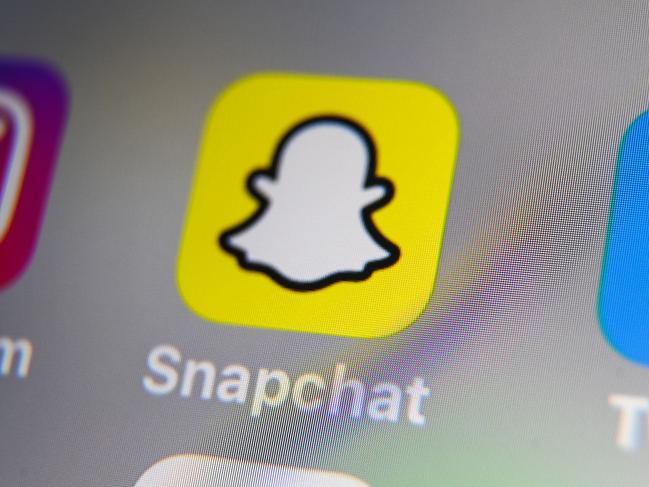 (FILES) This file photo taken on October 01, 2019, shows the logo of mobile app Snapchat displayed on a tablet in Lille. - US tech firm Snap on June 29, 2022, launched a subscription version of Snapchat as it looks to generate more money from the image-centric, ephemeral messaging app. (Photo by DENIS CHARLET / AFP)