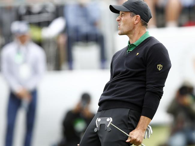 Adam Scott reacts to a missed putt on the 16th green during his loss to Xander Schauffele.