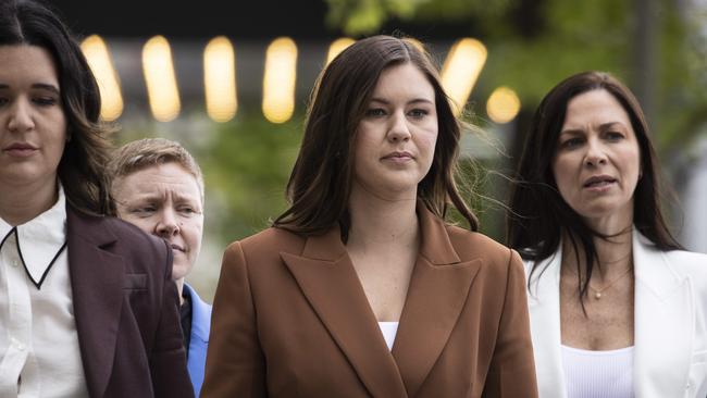 Brittany Higgins, centre, hit out at her treatment during the investigation and court case, saying she would ‘literally not be here today’ without the support of mental healthcare workers. Picture: Gary Ramage