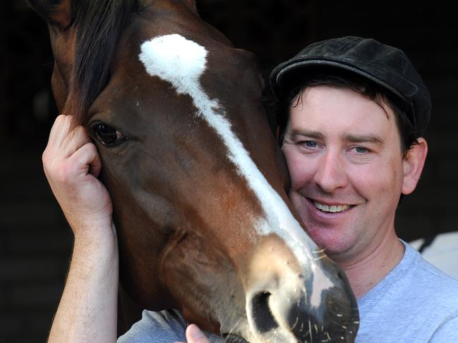 Adelaide Cup horses at early morning track work at Morphettville racecourse . Todd Balfour with racehorse Sean Baile Mor.