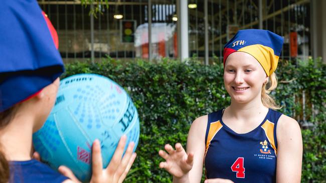 Jessica Jolly and Keely Whittaker understand the importance of sport and history at their school. Photo: Daniel Snare