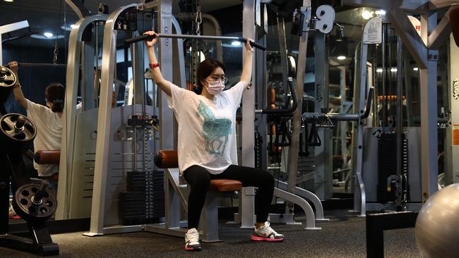 A woman works out at Chungwoon Sporex sports centre after gyms reopen with strict sanitary measures on September 15. Picture: Getty Images