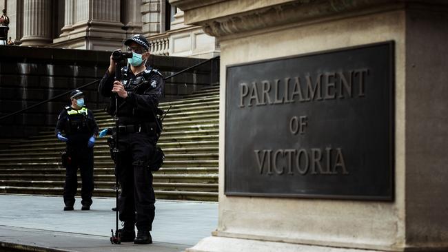 Police patrol the outside of Parliament House ahead of an anti-lockdown protest in early September. Picture: Getty Images