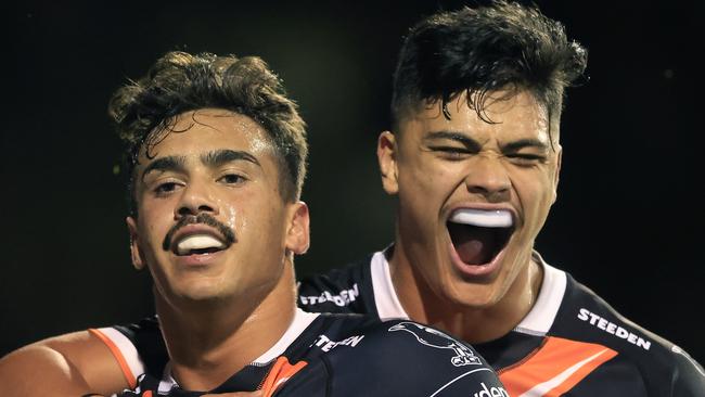 SYDNEY, AUSTRALIA - JUNE 04: Dane Laurie of the Tigers celebrates a try during the round 13 NRL match between the Wests Tigers and the Penrith Panthers at Leichhardt Oval, on June 04, 2021, in Sydney, Australia. (Photo by Mark Evans/Getty Images)