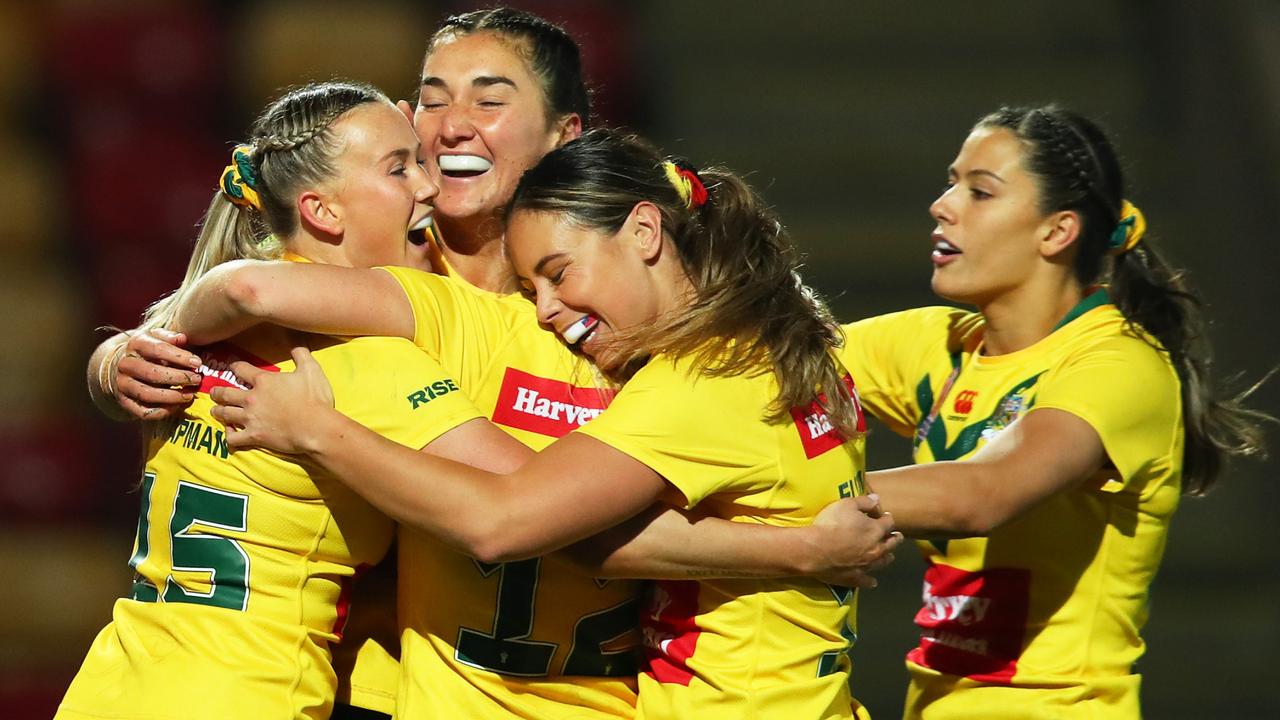 YORK, ENGLAND - NOVEMBER 06: Olivia Kernick of Australia celebrates their sides thirteenth try with team mates Tarryn Aiken during the Women's Rugby League World Cup Group B match between Australia Women and France Women at LNER Community Stadium on November 06, 2022 in York, England. (Photo by Ashley Allen/Getty Images)
