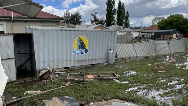 The shipping container which swept into Graham Wilson’s parents house during the flash flooding.