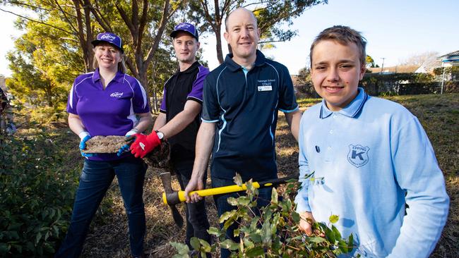 DoSomething Day 2018.Portraits taken on 25th July 2018 at Karonga School, Epping, of staff from The Epping Club clearing a green area at the school for special needs students. Pictured (L-R) is:Seona Wallace, Director of Epping Club.Ryan Clarke, food and beverage manager of Epping Club.Mark Gosbell, Principal of Karonga School.Karonga school Vice-Captain Joshua.(AAP Image / Julian Andrews).