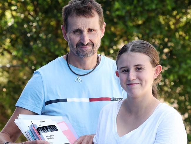 Richard Gray of the Grange with daughter Phoebe Gray, 15, with school supplies, Wilson. Picture: Liam Kidston