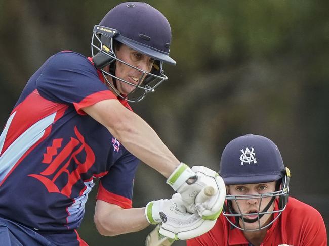 Premier Cricket: Melbourne v Dandenong. Dandenong batsman Tom Donnell and Melbourne keeper Sebastian Gotch. Picture: Valeriu Campan