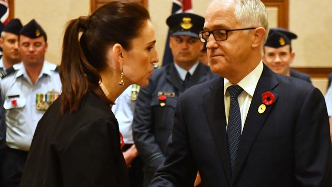 Jacinda Ardern and Malcolm Turnbull at a ceremony to commemorate Remembrance Day in Vietnam on Saturday. Picture: AAP