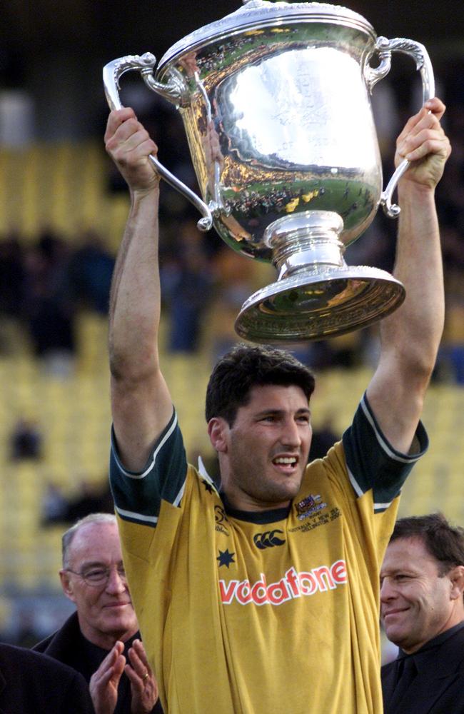 The iconic image of inspirational Wallabies captain John Eales holding aloft the Bledisloe Cup. Picture: ALLSPORT