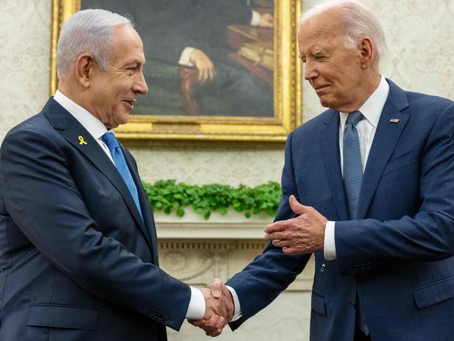 US President Joe Biden shakes hands with Israeli Prime Minister Benjamin Netanyahu during a meeting in the Oval Office of the White House in Washington, DC. Picture: AFP