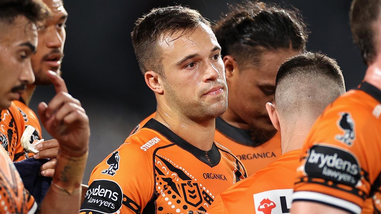 SYDNEY, AUSTRALIA - MAY 28: Luke Brooks of the Wests Tigers looks dejected during the round 12 NRL match between the South Sydney Rabbitohs and the Wests Tigers at Accor Stadium, on May 28, 2022, in Sydney, Australia. (Photo by Cameron Spencer/Getty Images)