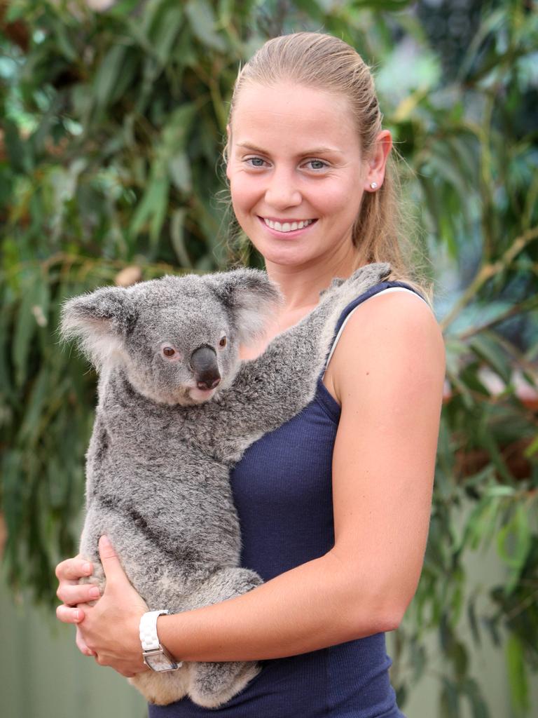 Tennis player Jelena Dokic cuddles Nivea the koala