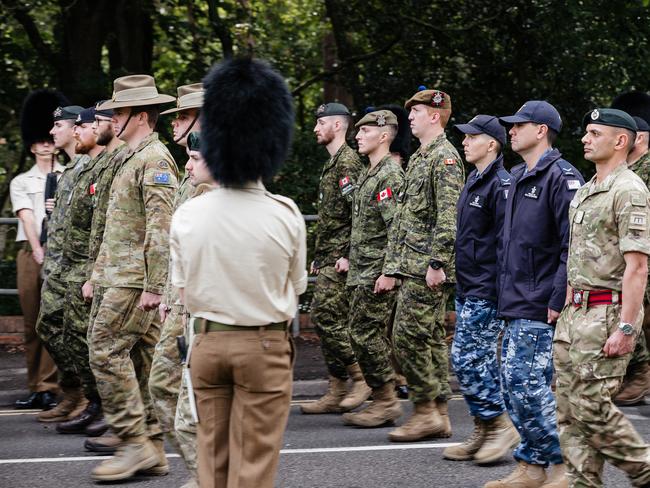 Australian Defence Force, Canadian Armed Forces and New Zealand Defence Force personnel march during a parade rehearsal. Picture: Supplied.