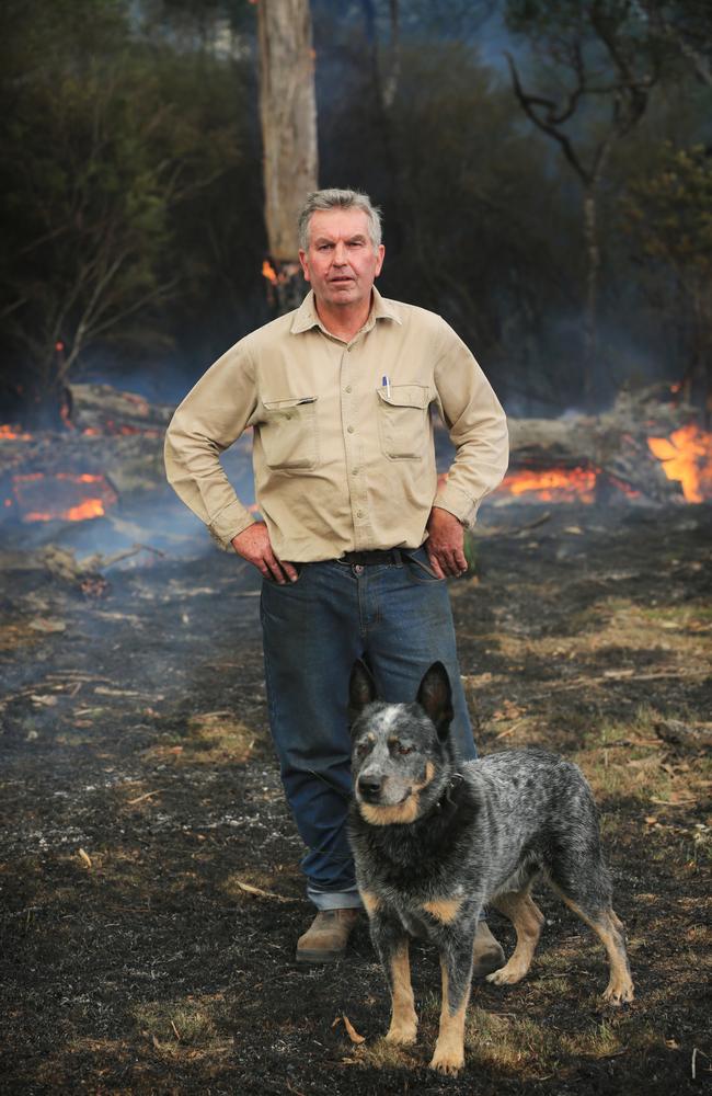 Mr Doyle with his dog Buddy on his Nethercote property on Tuesday. Picture: John Ford