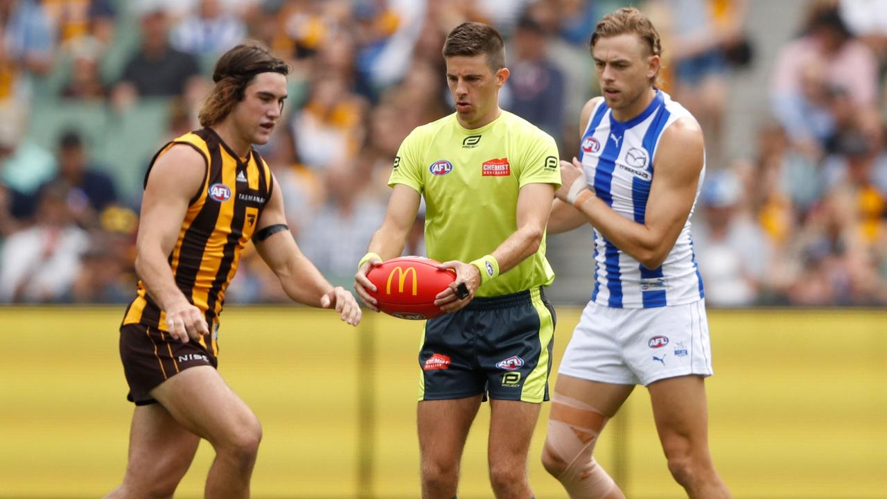 MELBOURNE, AUSTRALIA - MARCH 20: during the 2022 AFL Round 01 match between the Hawthorn Hawks and the North Melbourne Kangaroos at the Melbourne Cricket Ground on March 20, 2022 In Melbourne, Australia. (Photo by Dylan Burns/AFL Photos) Umpire Michael Pell