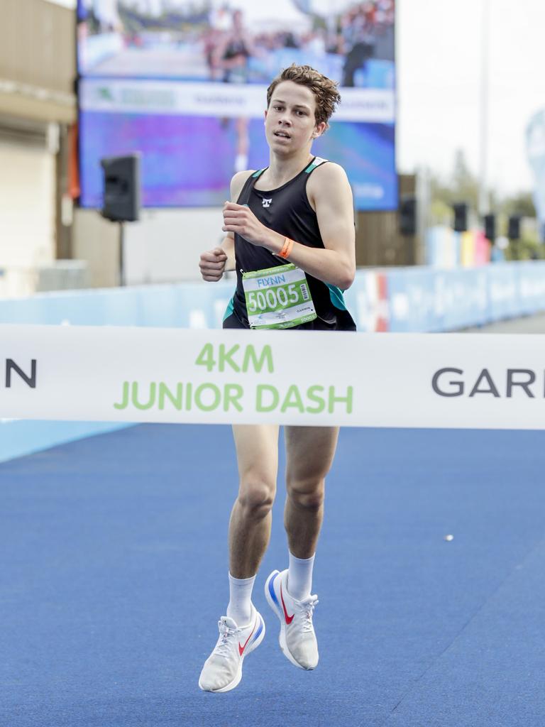 Flynn Pumpa wins the Four Kilometre Junior Dash. Picture: Tim Marsden.