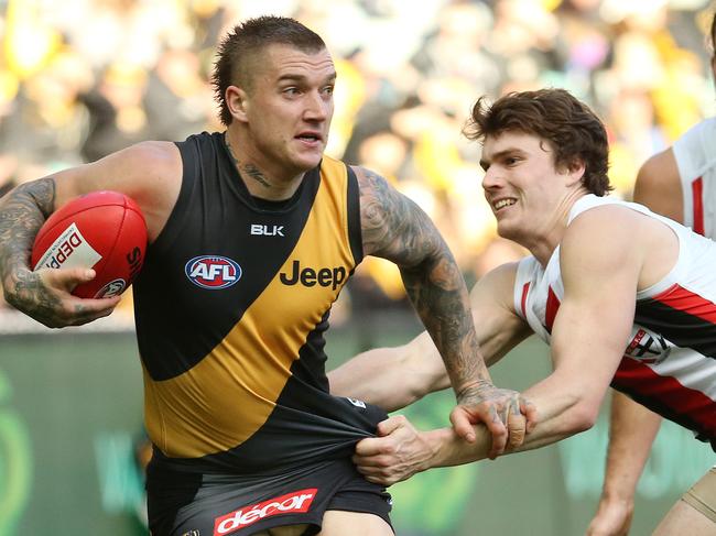 AFL Round 22- Richmond v St Kilda at MCG , Richmond's Dustin Martin gets tackled by St Kilda's Blake Acres. 20th August 2016. Picture: Colleen Petch.