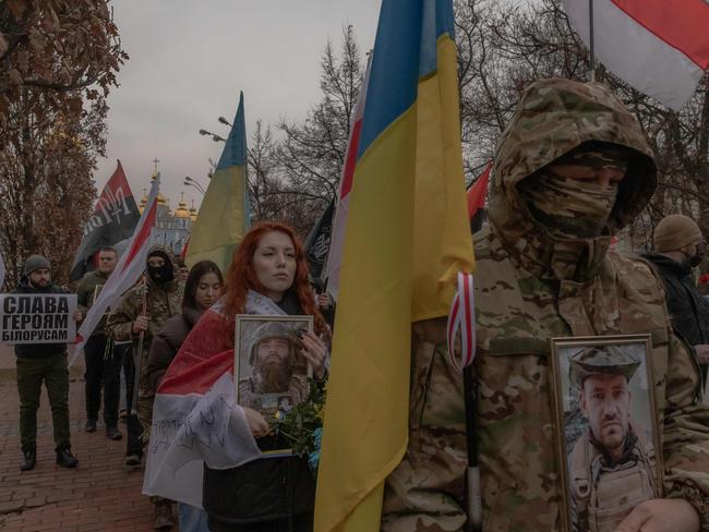 People march in Kyiv in memory of Belarussians who died for Ukraine during the Russian invasion. Picture: AFP